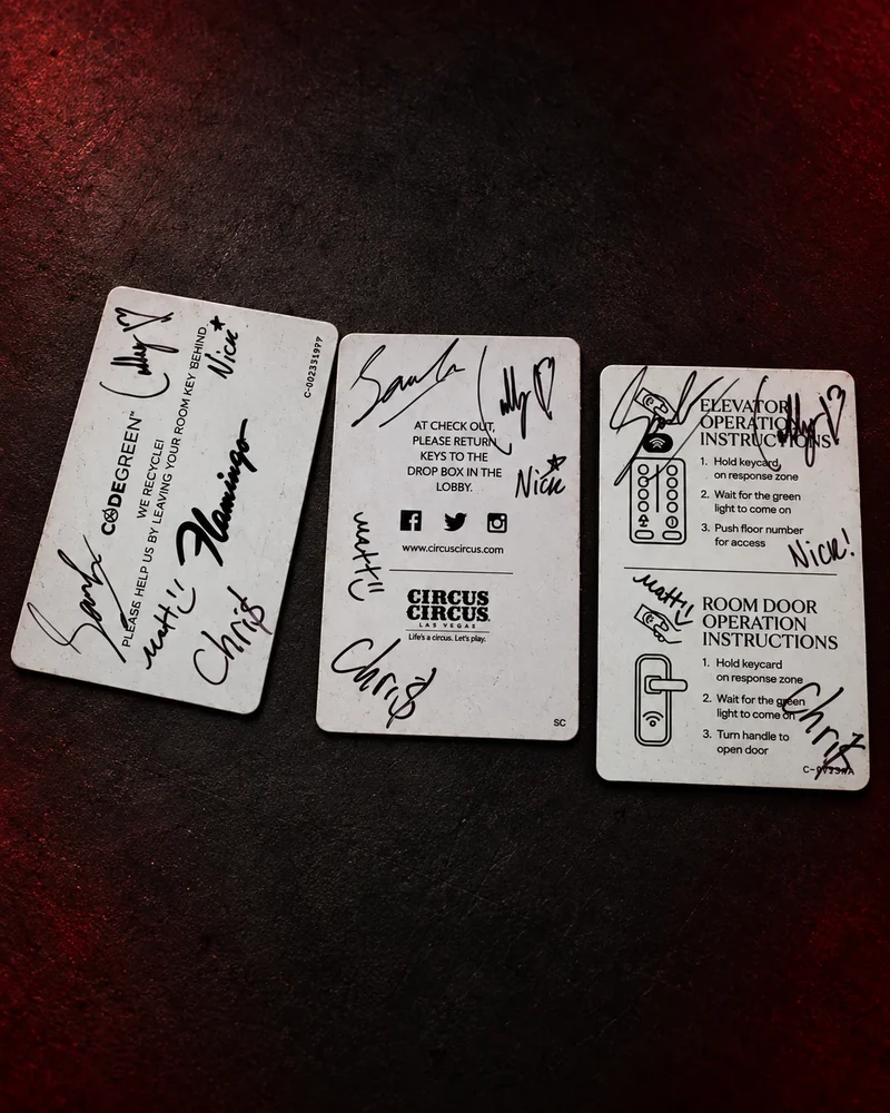 Three hotel key cards signed by us and the Sturniolo Triplets.